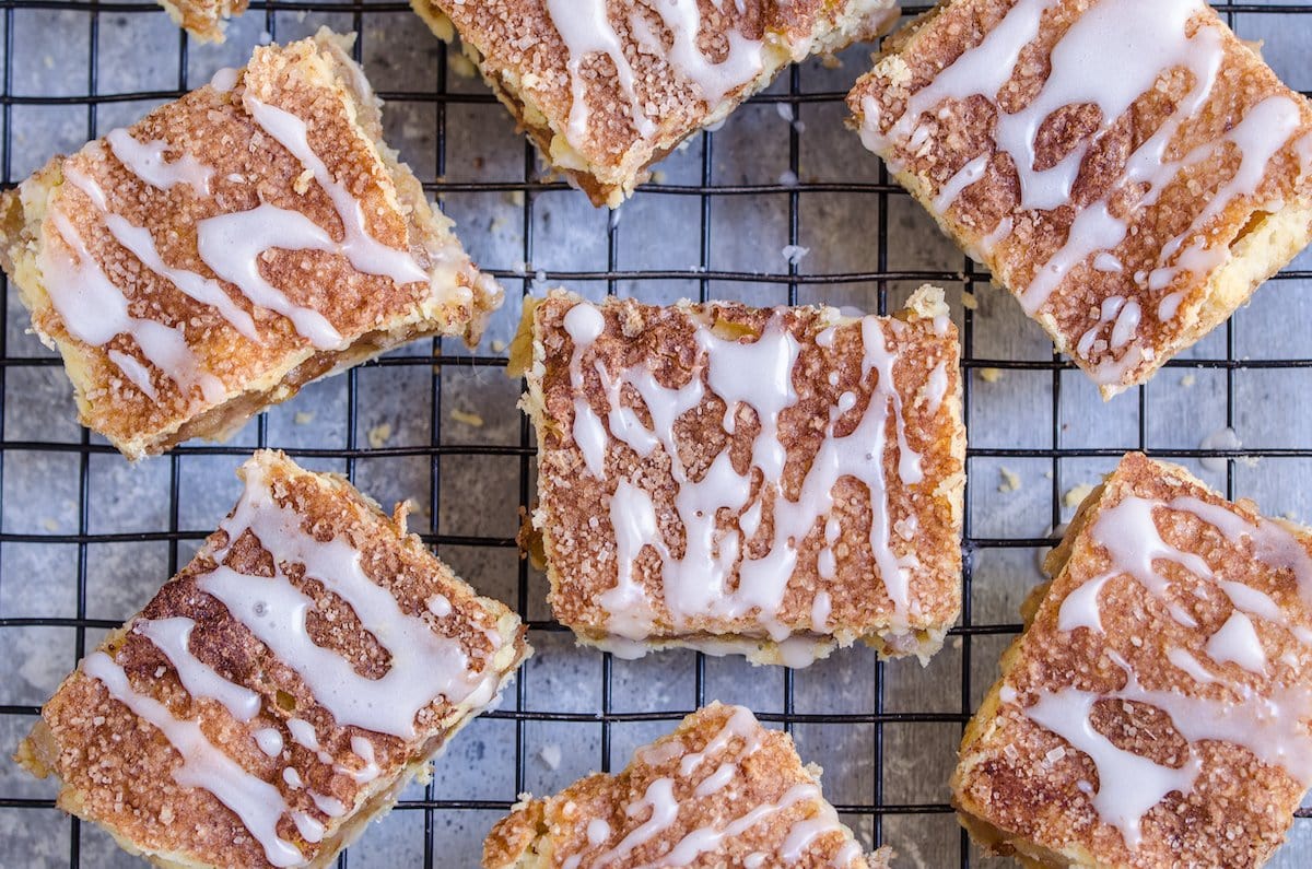 Pie bars with glaze drizzle on top.