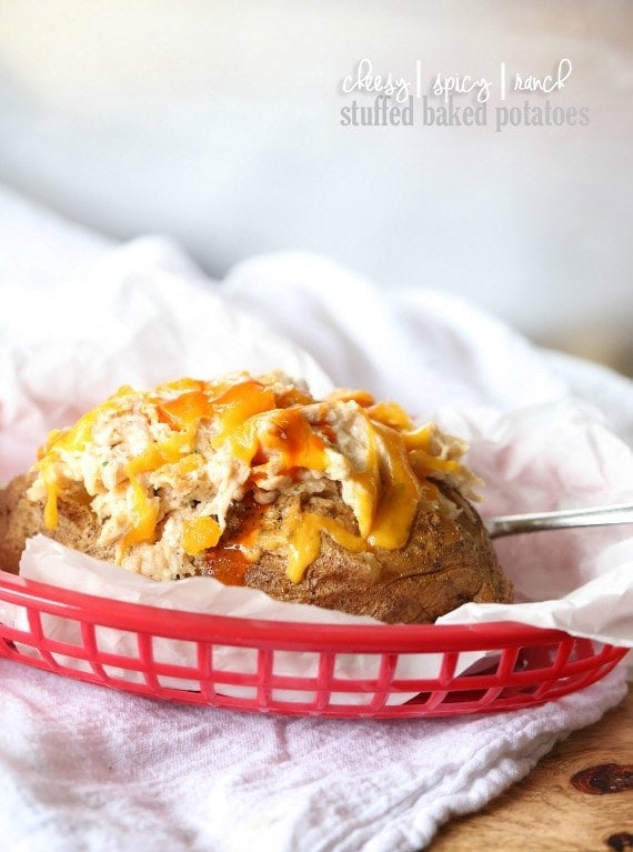 Cheesy Spicy Ranch Stuffed Baked Potatoes...the most addicting baked potato you