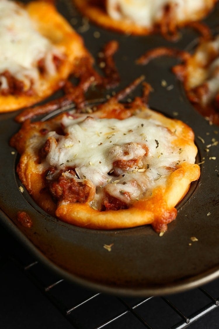 Baked Pizza muffin right out of the oven in a muffin tin