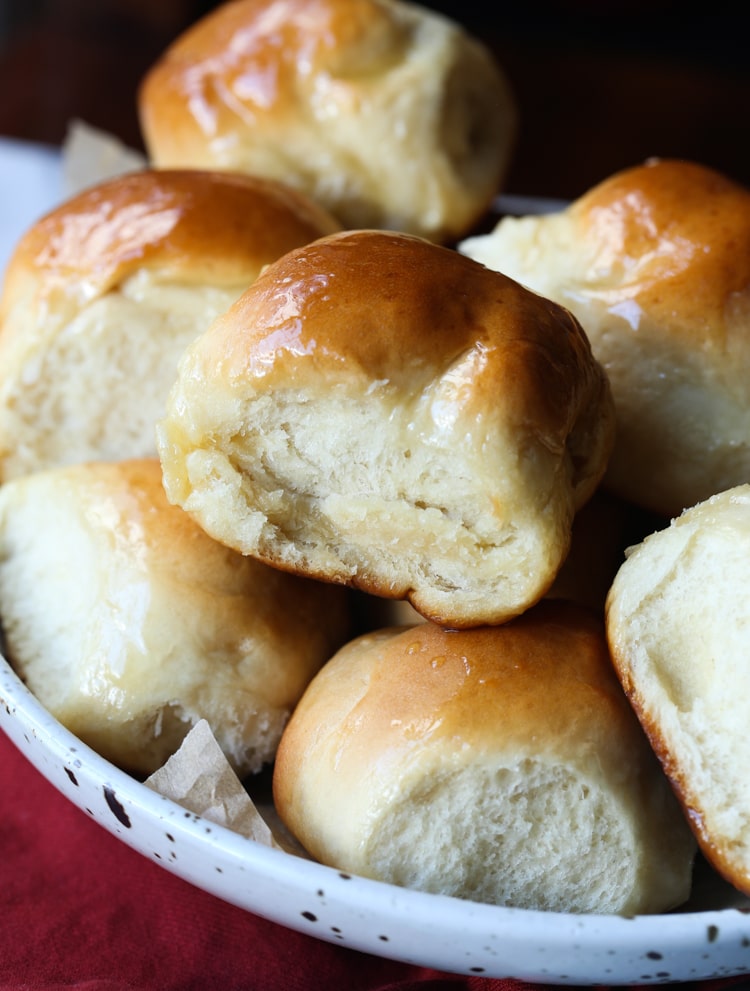This Easy Sweet Dinner Rolls recipe is topped with honey butter